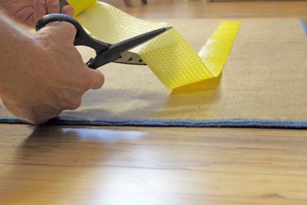 applying and cutting of adhesive tapes