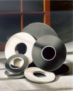 adhesive tapes in black and white rolls