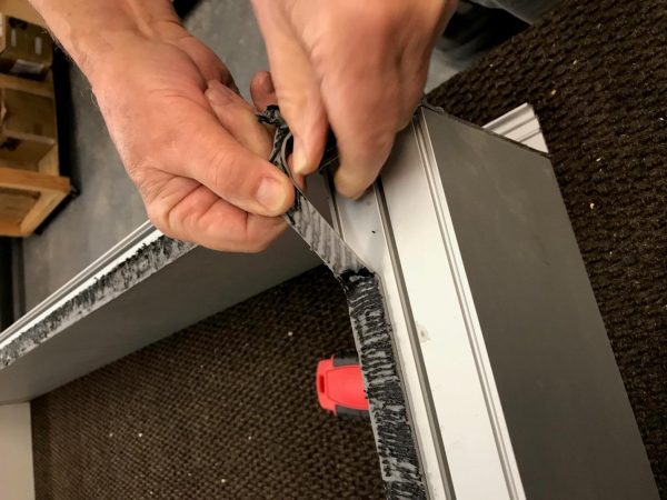 removing tapes to deglaze construction tape